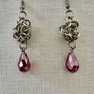 Silver tone and red crystal teardrop drop earrings